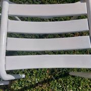 pair of white metal chairs, Tolix style
