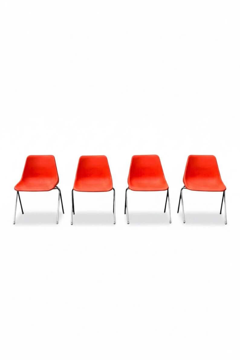 Set of 4 orange chairs designed by Robin Day for Hille.