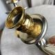 Pair of silver and gold metal candlesticks