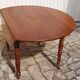 Round oval table with solid cherry leaves, 19th century