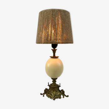 Late nineteenth century bronze lamp and ostrich egg, rope lampshade