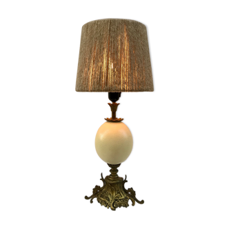 Late nineteenth century bronze lamp and ostrich egg, rope lampshade