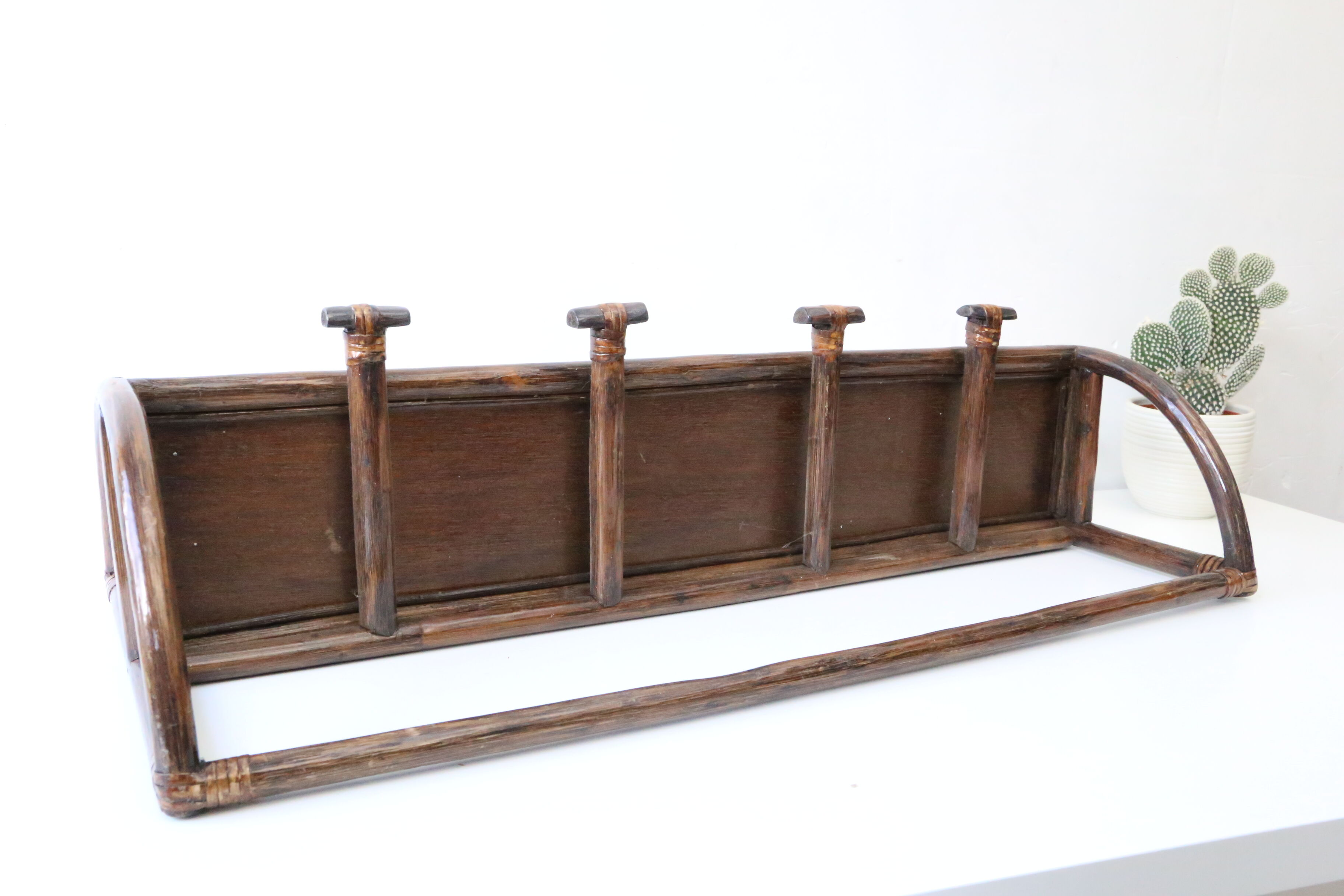 Rattan wall coat holder