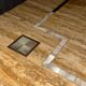 Coffee table in travertine with mother-of-pearl inlays.
