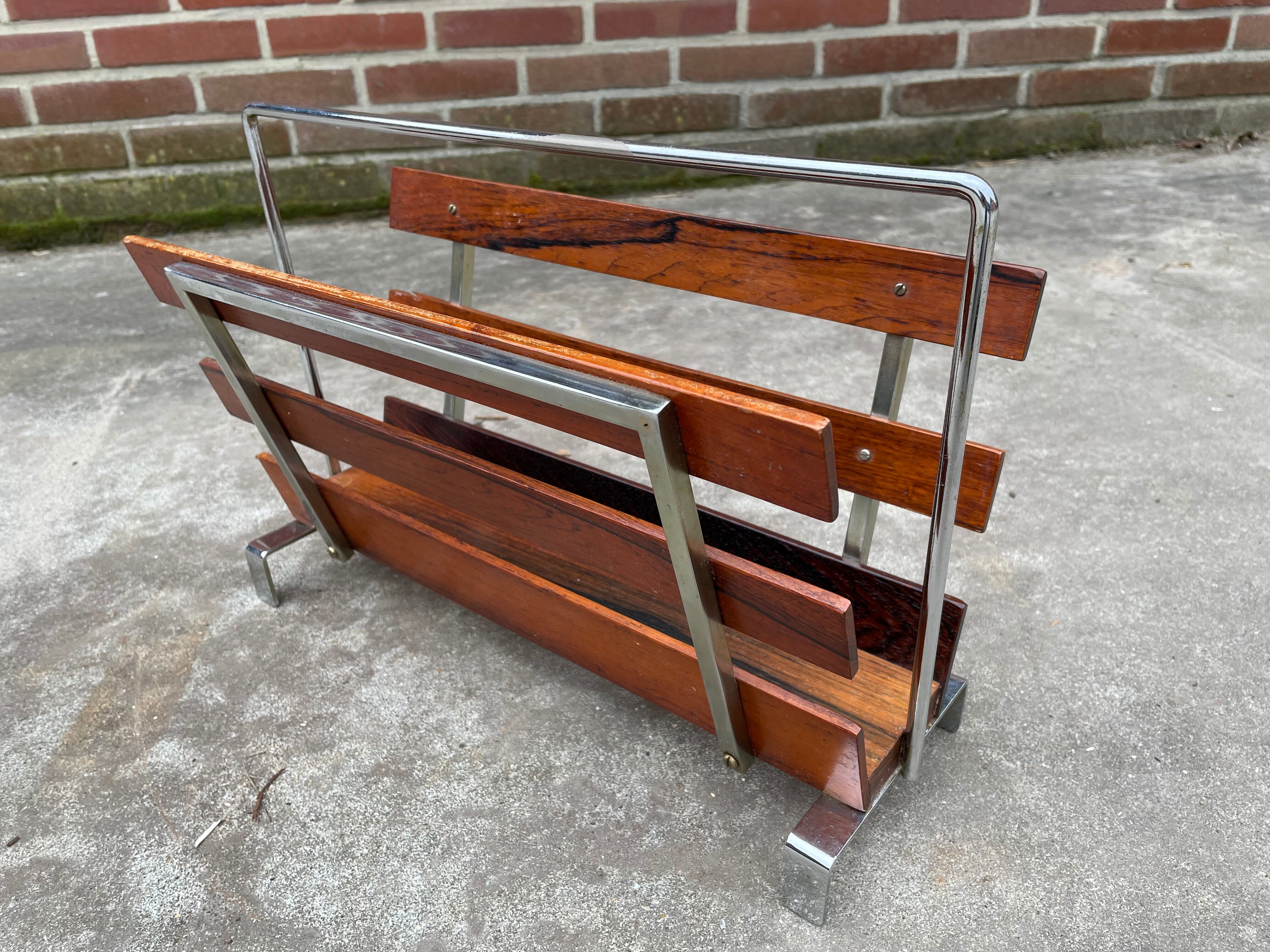 Vintage magazine rack from  rosewood and chrome design