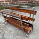 Porte-revue en bois de rose chrome