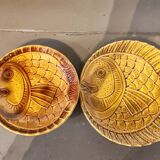 Vintage barbotine plates with fish decoration, 22 pieces.