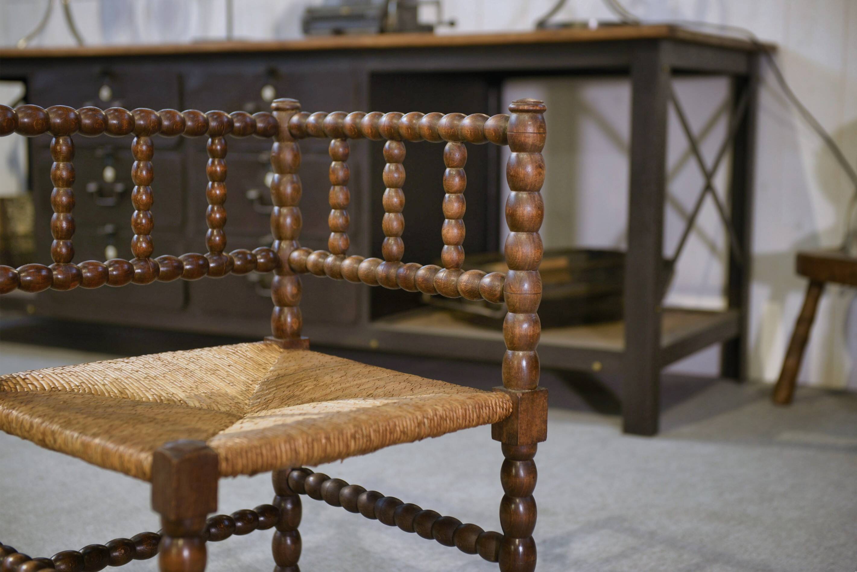 Pair of turned wooden corner chairs from the 1950s.