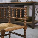 Pair of turned wooden corner chairs from the 1950s.