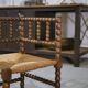 Pair of turned wooden corner chairs from the 1950s.
