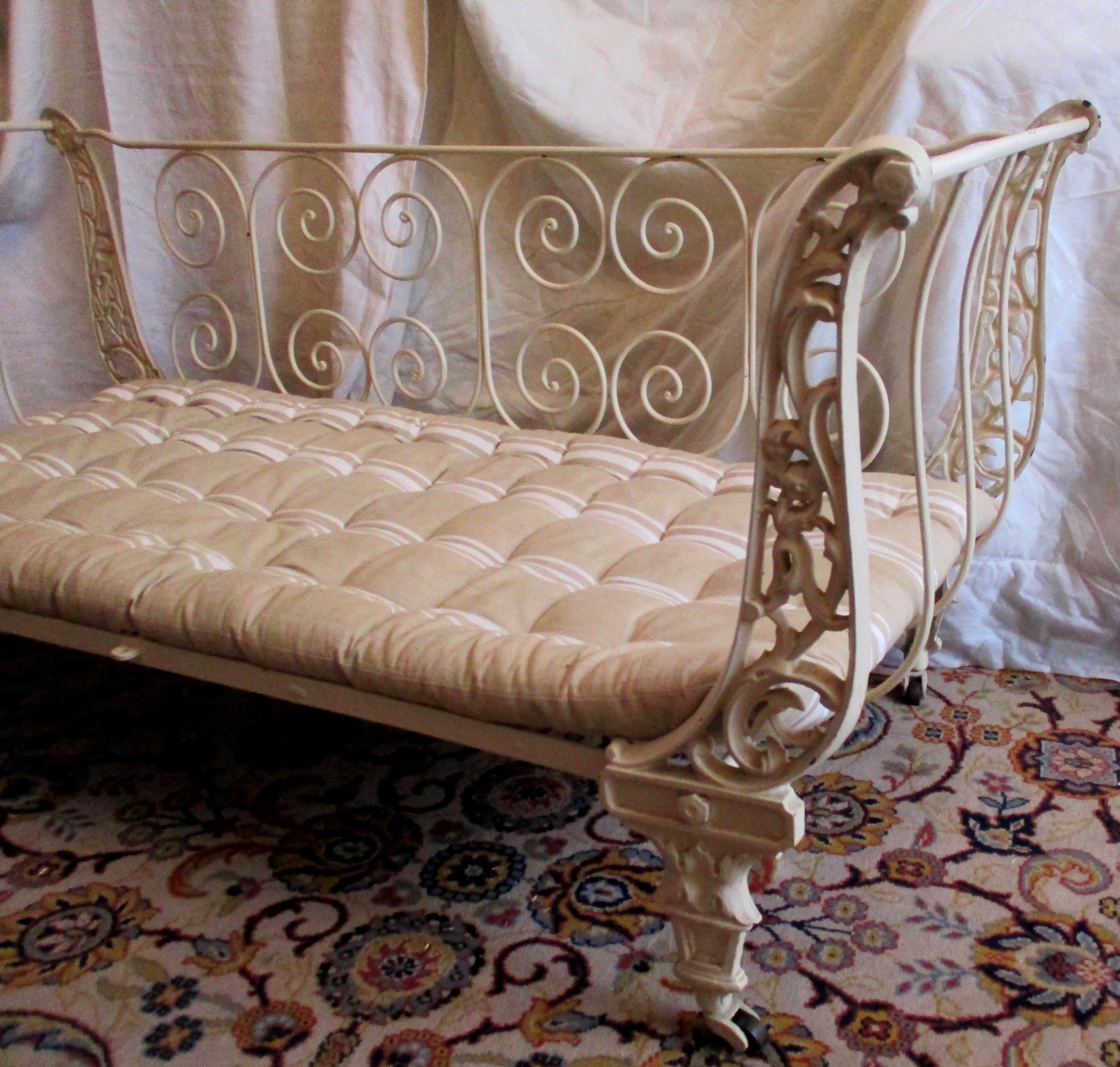 Cast iron and iron children's bed at the end of the 19th century
