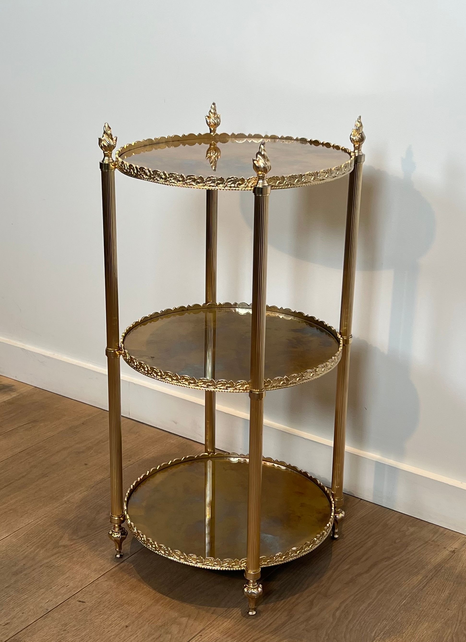 Round silver-plated brass table with triple eglomisé mirror tops from Maison Jansen.