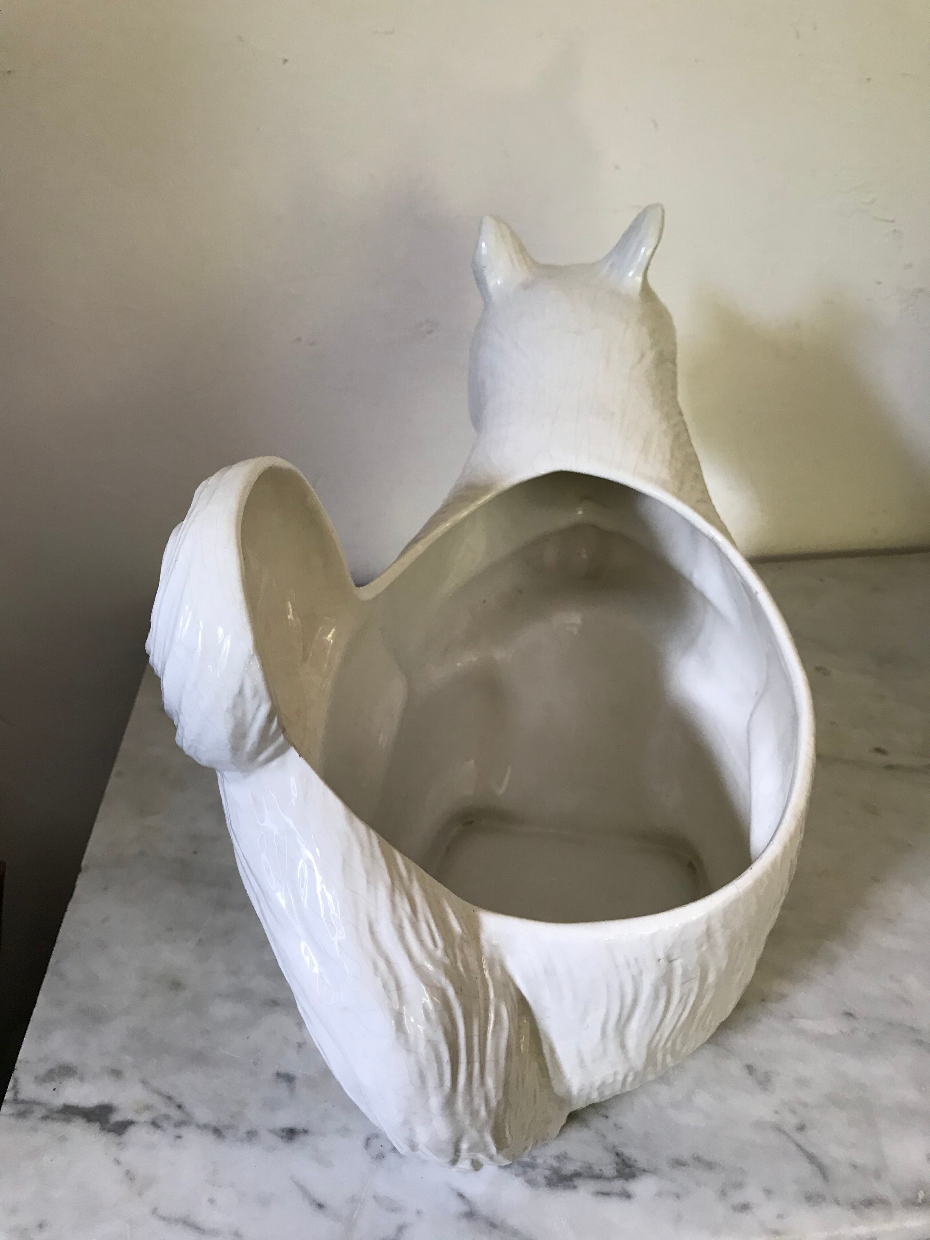 Cracked ceramic zoomorphic pot cache