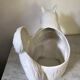 Cracked ceramic zoomorphic pot cache