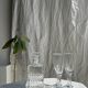 Set of 5 glass champagne flutes with twisted ribbed base