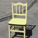 Formica and yellow wood chair