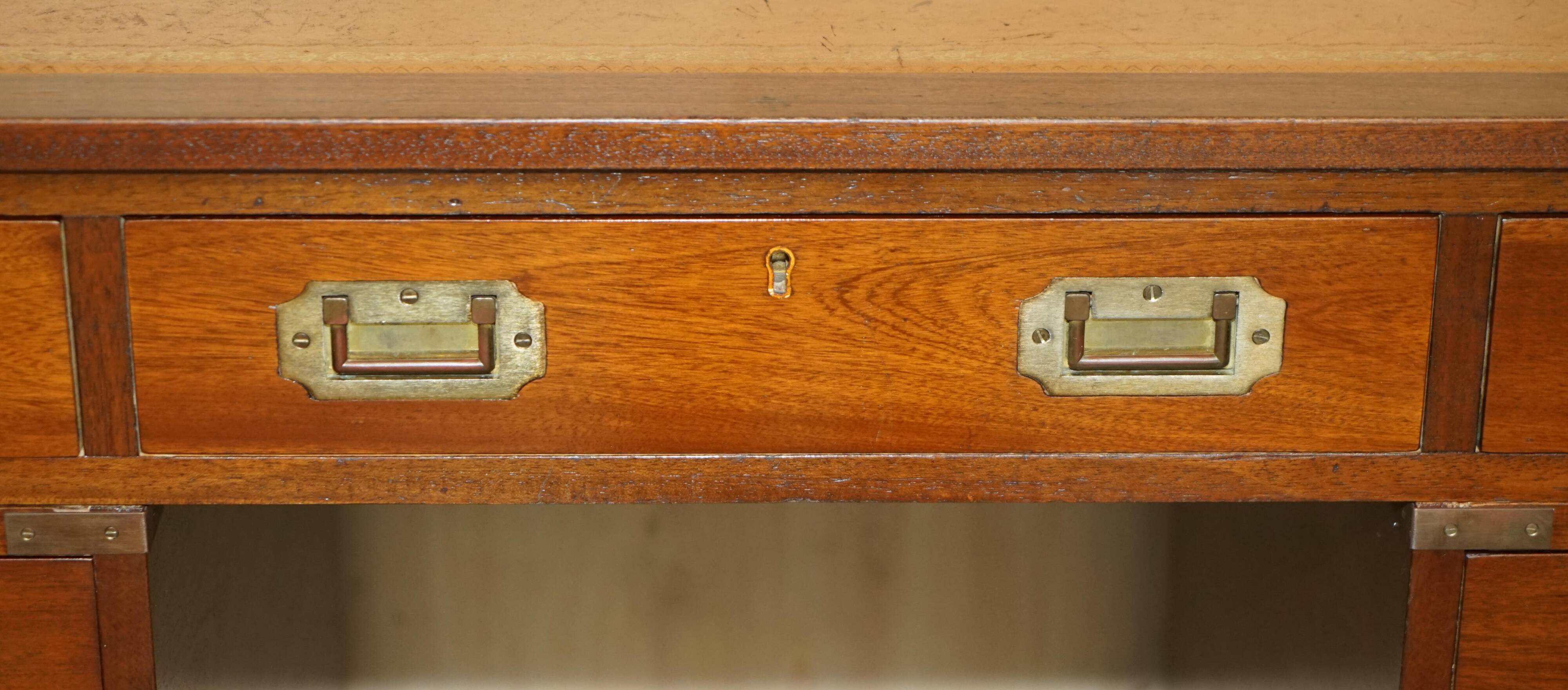 Vintage Harrods Kennedy desk in military campaign style with drawers.