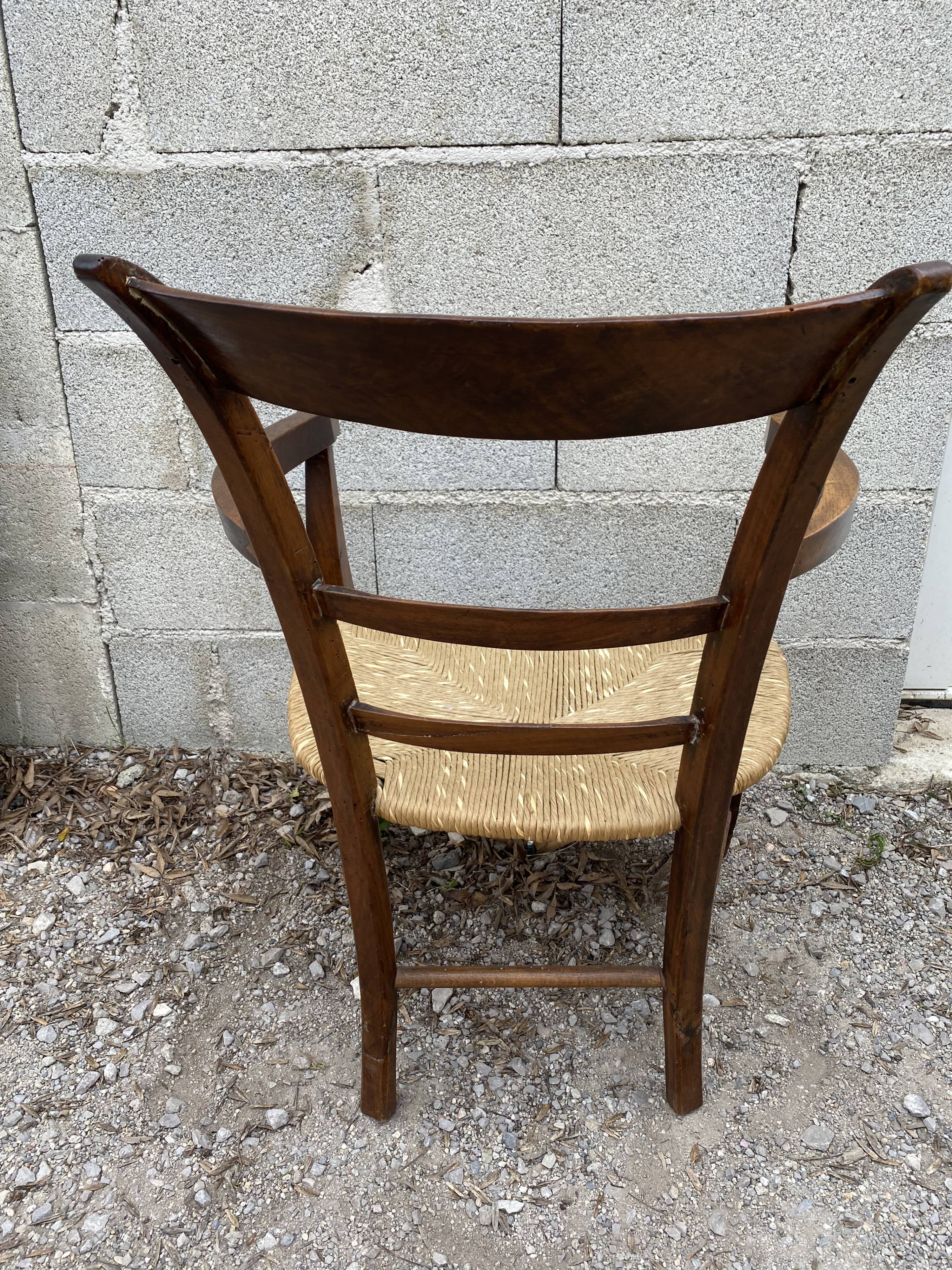 Antique straw armchair