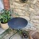 Iron pedestal table
