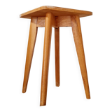 Wooden stool with tapered legs