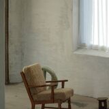 Danish modernist lounge chair in oak and lambswool, Henning Kjærnulf, 1960s