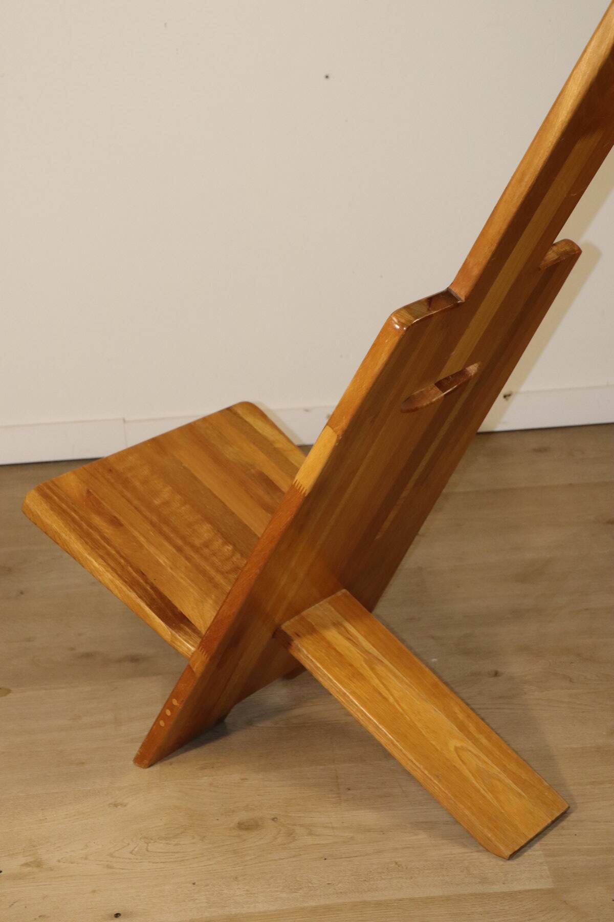 Sculptural brutalist armchair in solid elm, 1980.