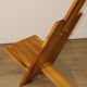 Sculptural brutalist armchair in solid elm, 1980.