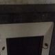 White veined black marble fireplace