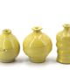 Trio of yellow ceramic vases, 70s