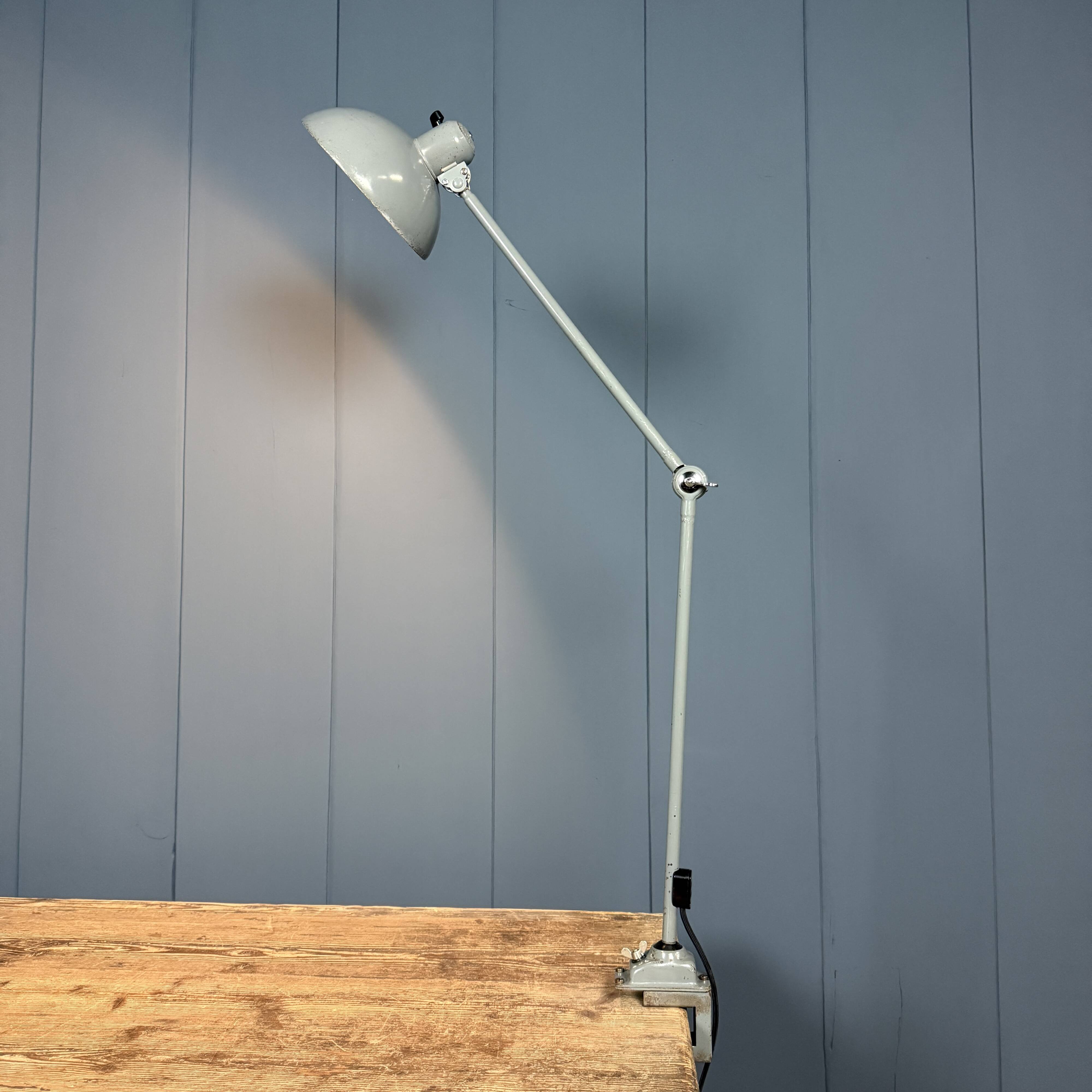 Grey two-arm Kaiser Idell clamp lamp model