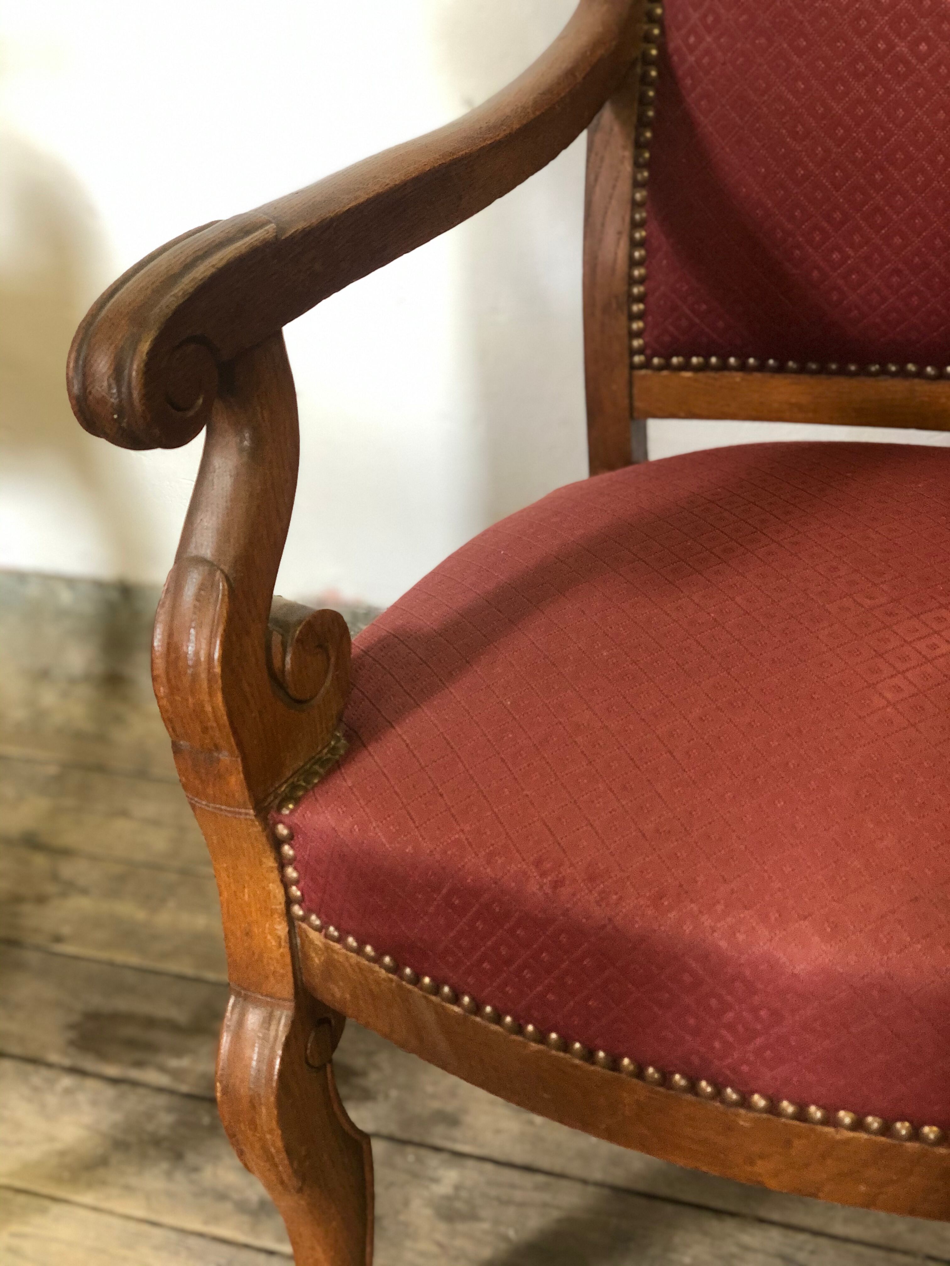 Louis Philippe era armchairs in burgundy-lined ground oak