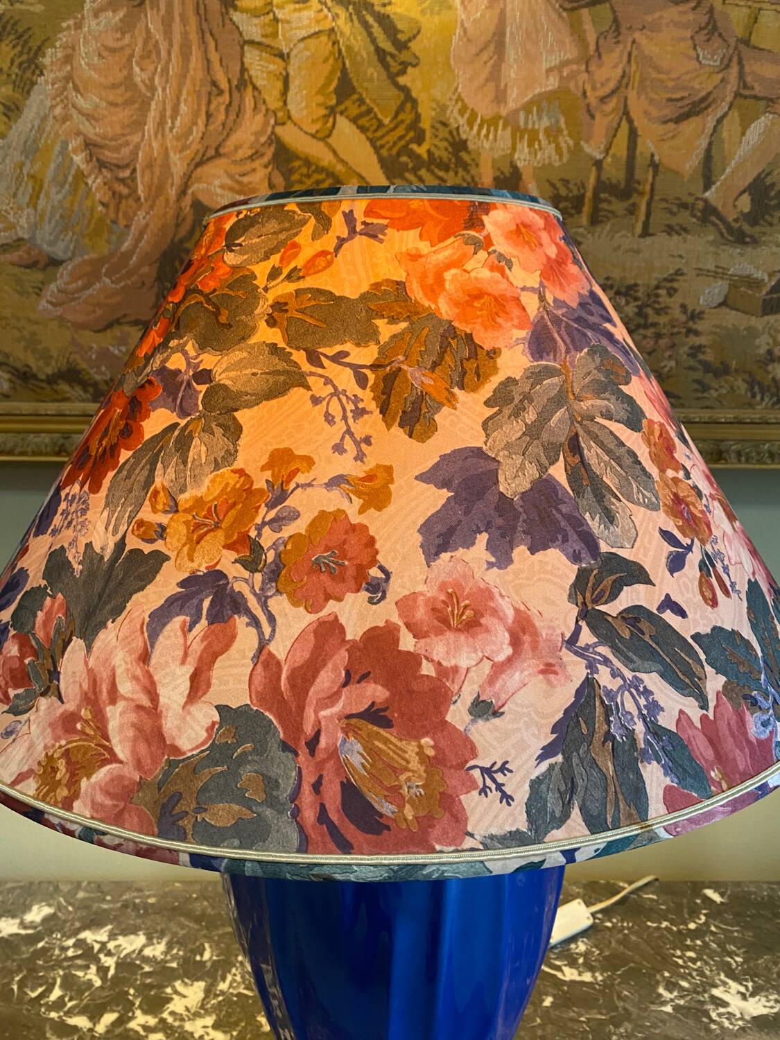 Large blue ceramic lamp with floral shade