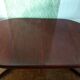 Danish extendable round table on central support