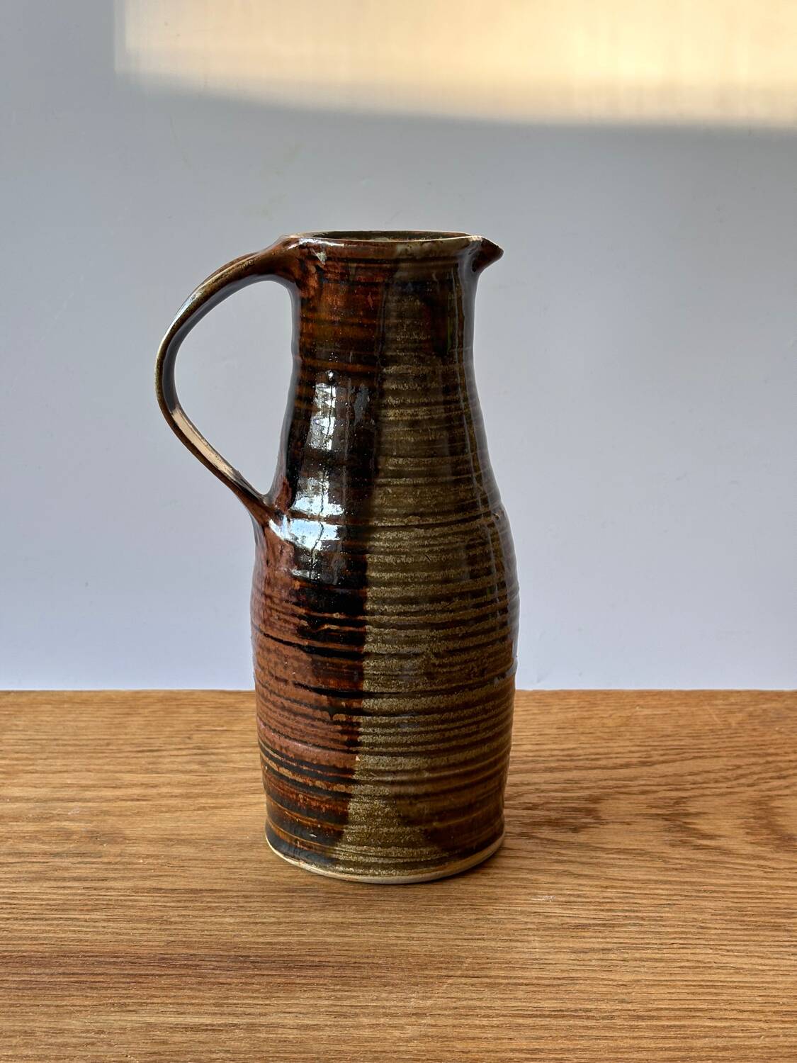 Vintage enameled stoneware pitcher