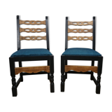 Paire de chaises brutalistes en bois relookée en noir assise tissu vert canard