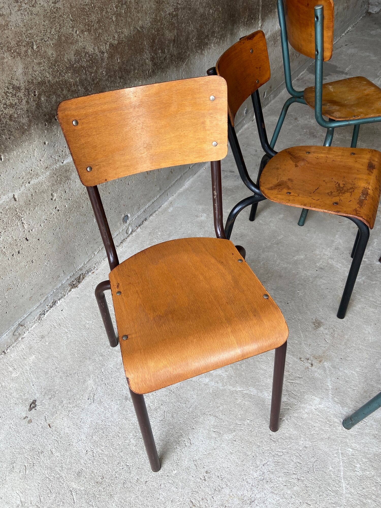 Set of 10 vintage mismatched industrial chairs mullca
