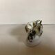 Chiens en porcelaine