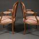 Pair of Louis XV style convertible armchairs