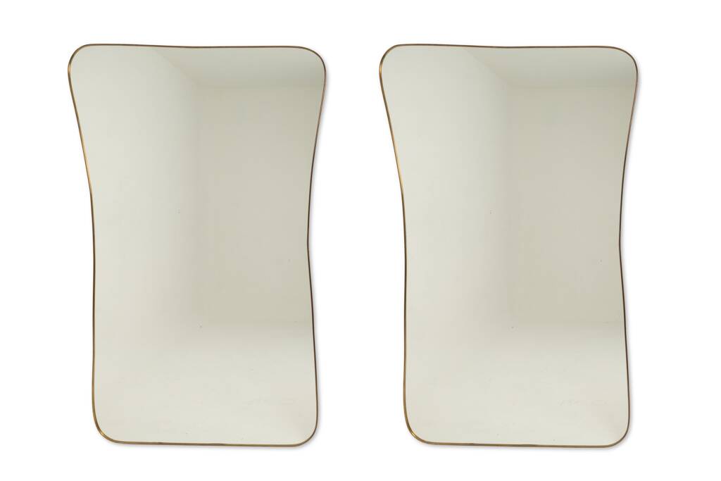 Golden brass mirror in the style of Gio Ponti. 1980s/90s.