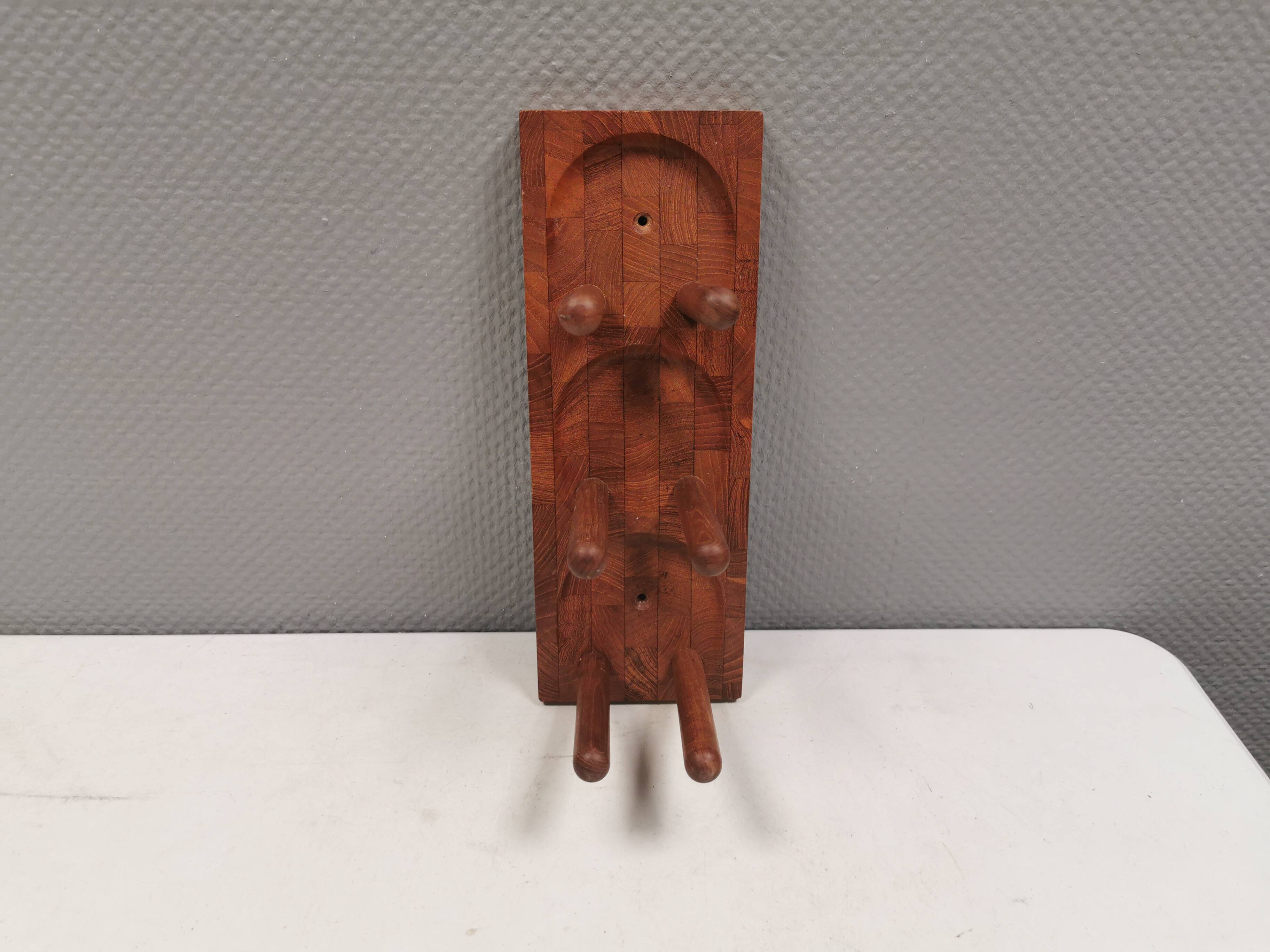 Beautiful Danish wine rack/holder for 3 bottles of wine on the wall. 1980s