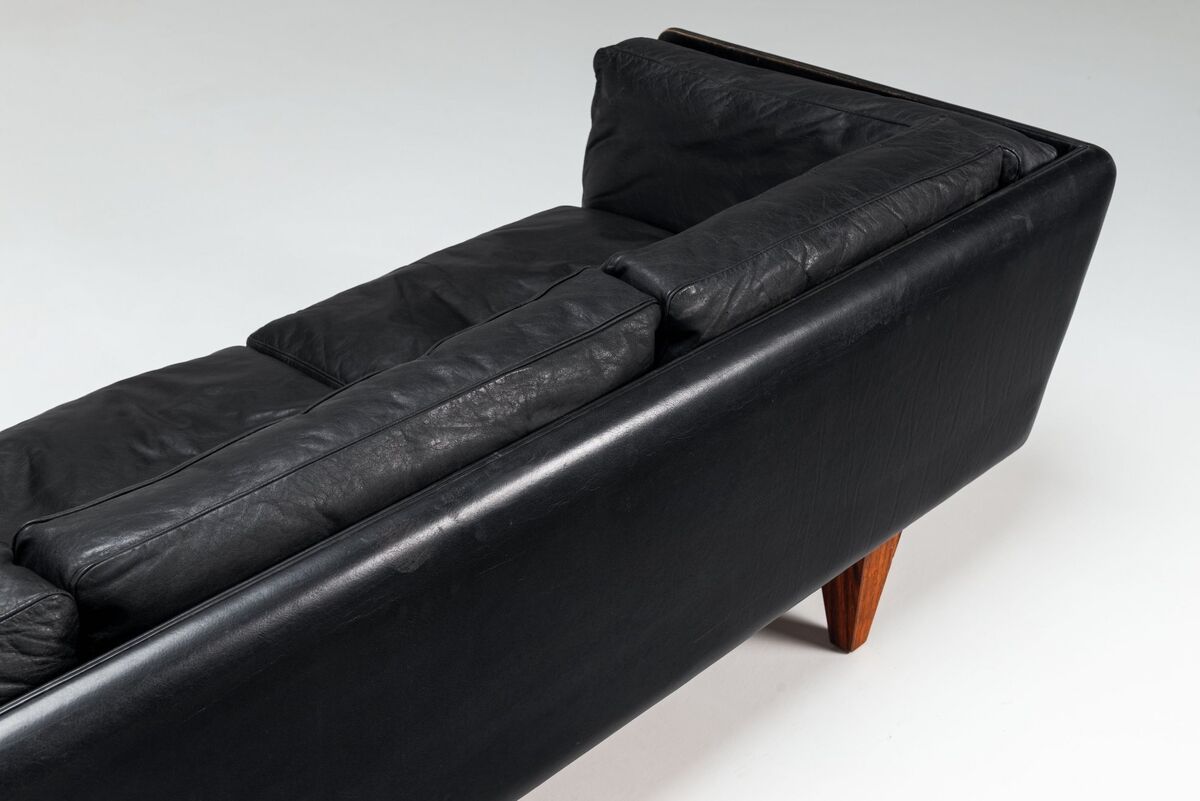 Illum Wikkelso model V11 sofa in black leather by Holger Christiansen, Denmark, 1960