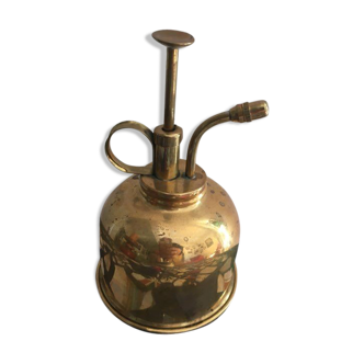 Golden metal and brass spray