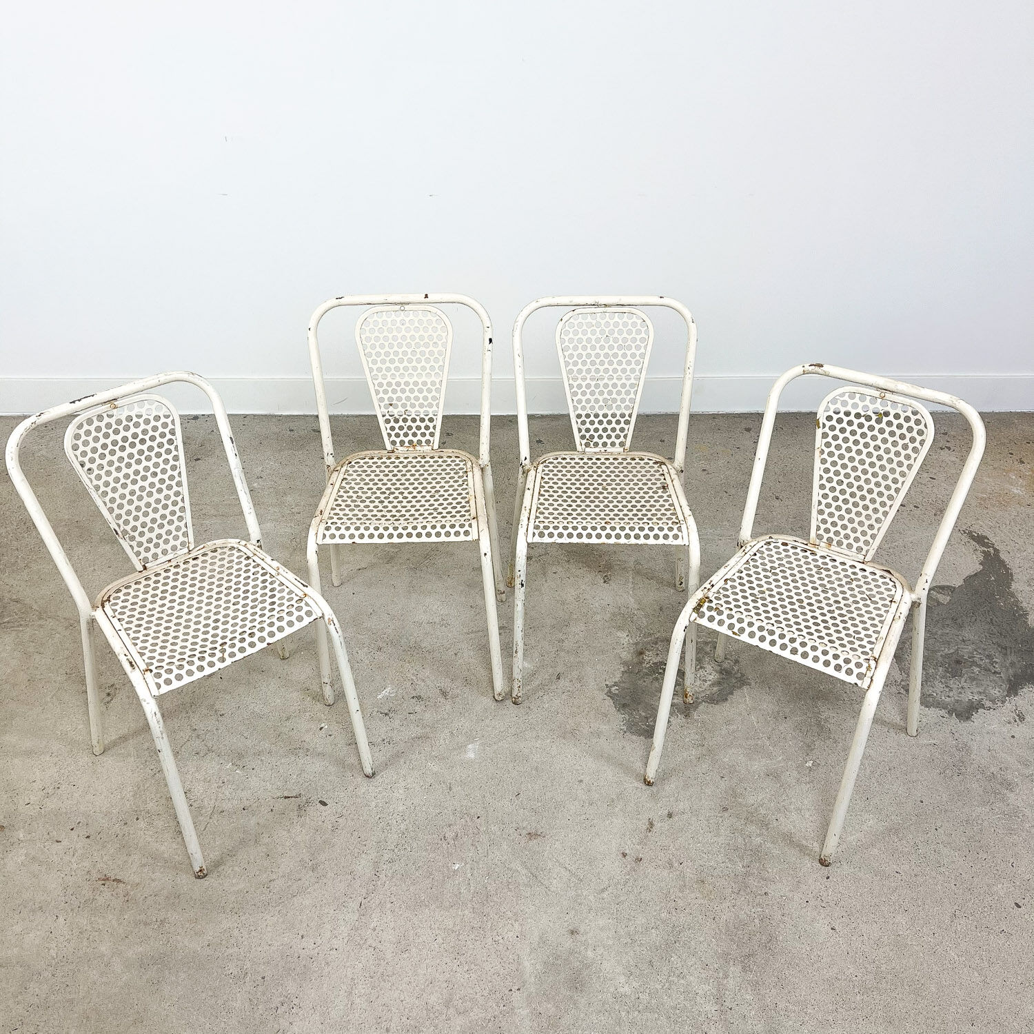 Set of four vintage industrial metal bistro chairs by Rene malaval