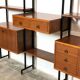 Modular storage unit and teak bookcase. Italy, 60s