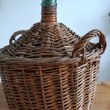 Dame Jeanne in her wicker and rattan clothing