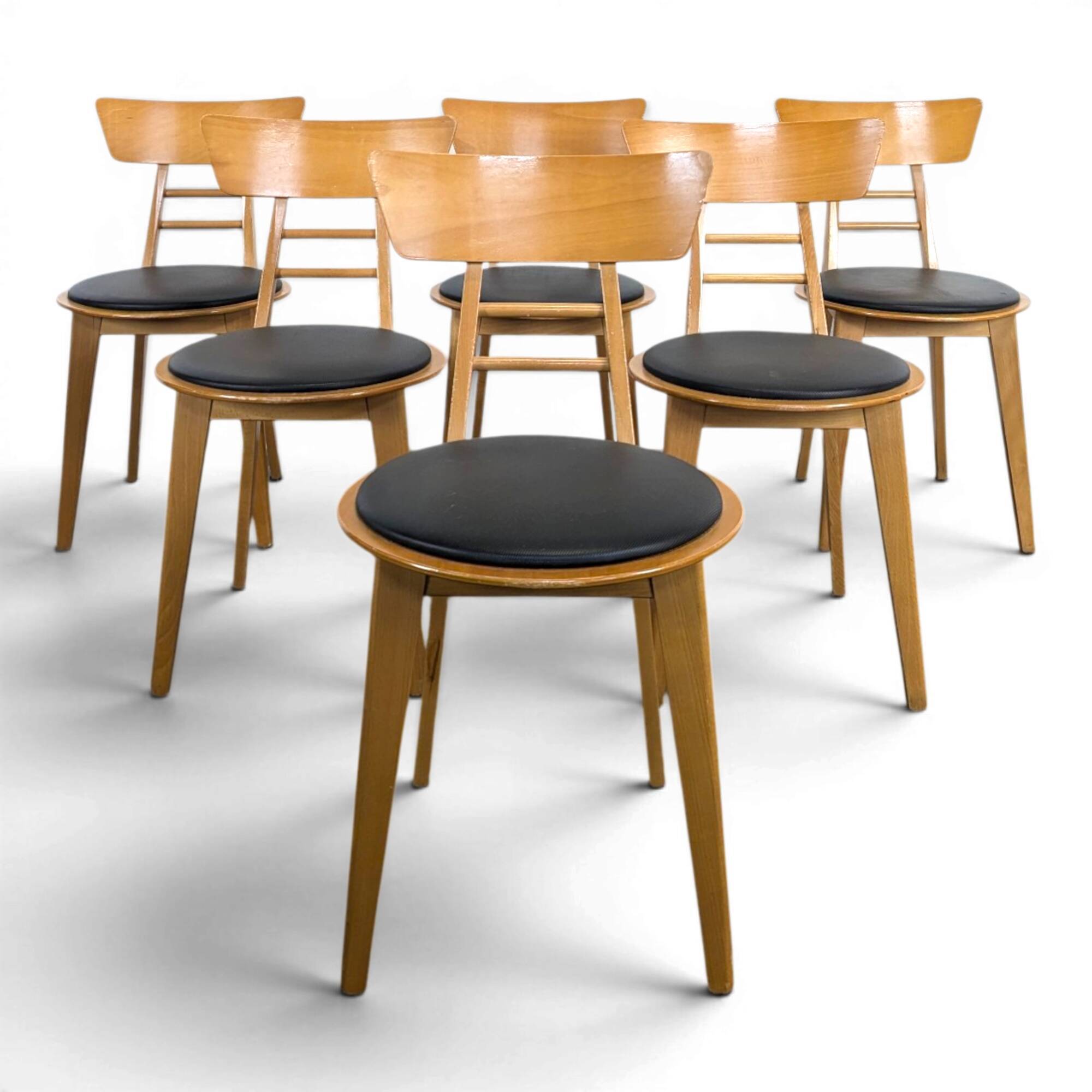 Set of 6 chairs published by Ton.