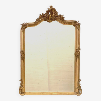 Miroir de style Louis XV en bois et stuc doré XX siècle