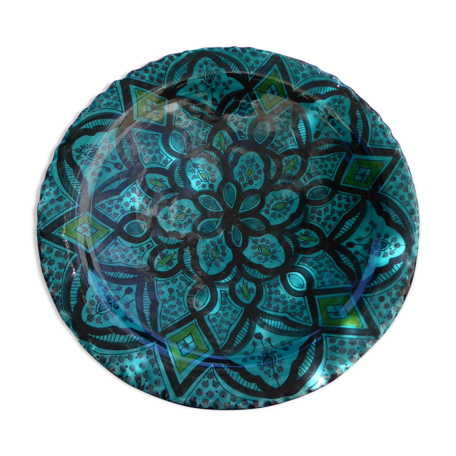 Hand-painted vintage oriental hollow dish, black patterns on a turquoise background