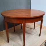 Half moon table with 3 elongations