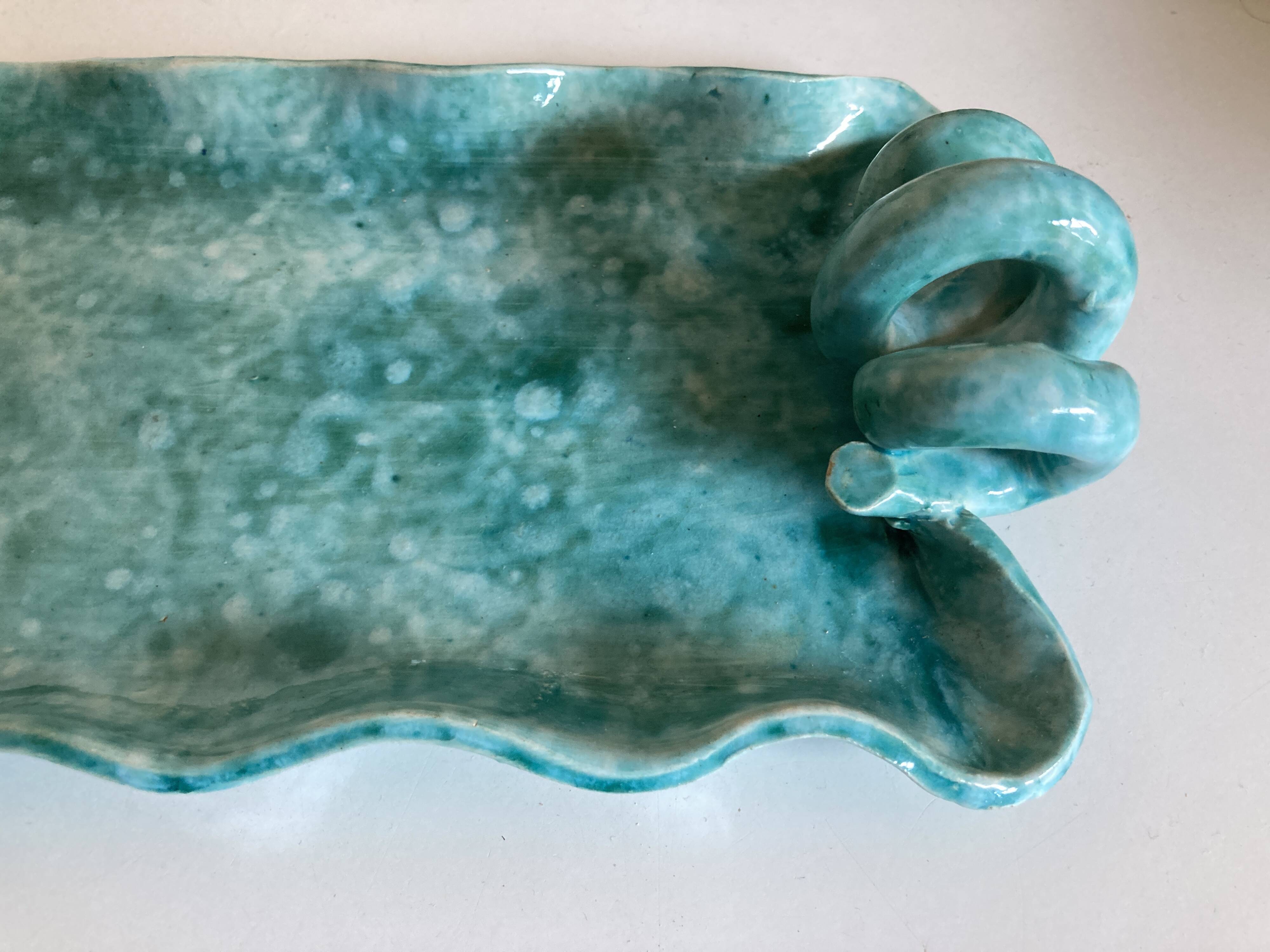 Wavy turquoise glazed earthenware plate 1960 Provence